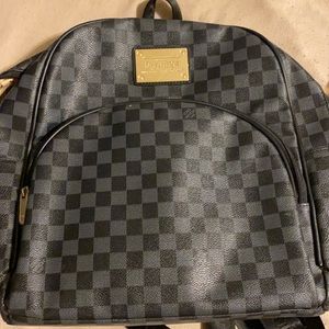 Luis Vuitton book bag
